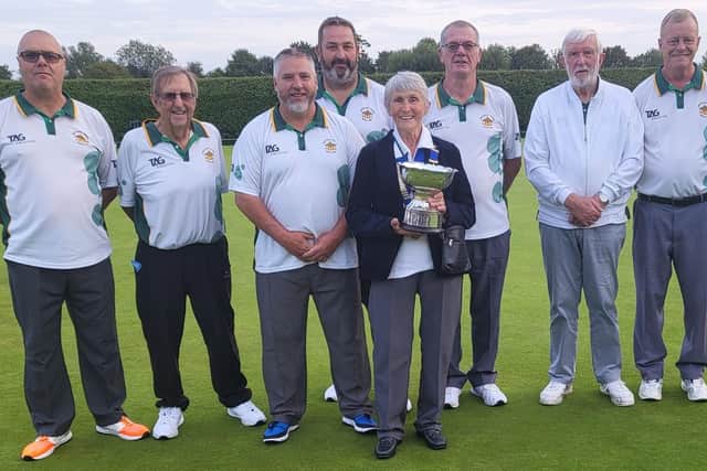 ​The winning Whittlesey Manor A team with Peterborough League president Angela Turner.