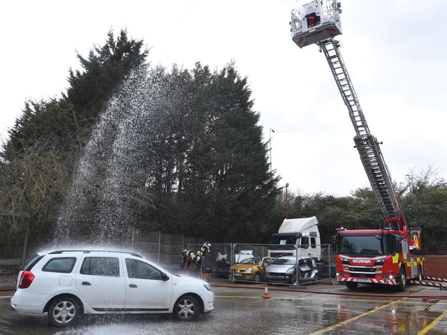 Stanground Fire Station green watch fire fighters at their annual Fire Fighters Charity car wash