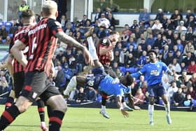 Posh forward Ephron Mason-Clark tries an overhead kick against Ipswich. Photo: David Lowndes.