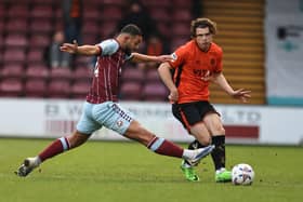 Connor Wood (orange) in action for Peterborough Sports. Photo Darren Wiles