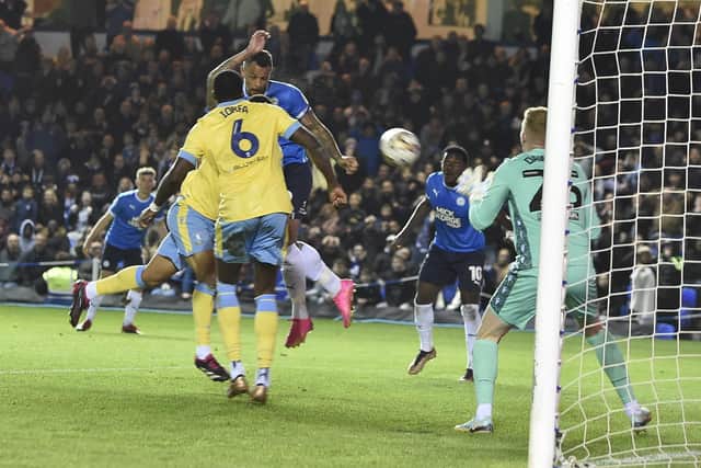 Jonson Clarke-Harris scores the fourth Posh goal against Sheffield Wednesday. Photo: David Lowndes.