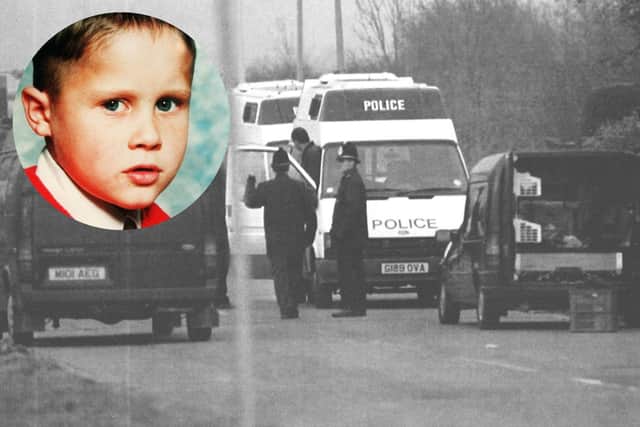 Police at the scene where the naked body of six-year-old murder victim, Rikki Neave, was found in undergrowth less than 500 yards from his home in 1994.