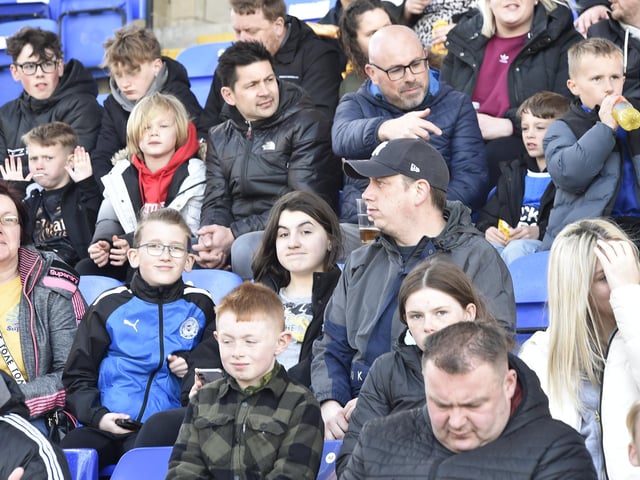 Peterborough United fans are pictured enjoying another home win.
