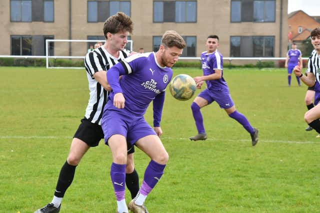 Action from Stanground Sports (purple) v Oundle. Photo David Lowndes.