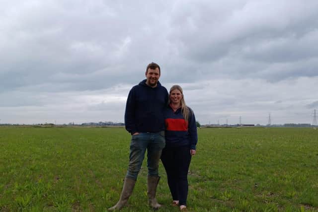 Hannah Hetherington and Tom Martin on their farm in Outwell.