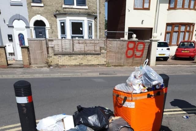 The rubbish dumped in the street