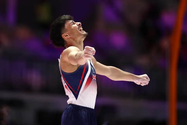 Jake Jarman celebrates his Floor gold medal at the World Championships in Indonesia. (Photo by Yong Teck Lim/Getty Images)