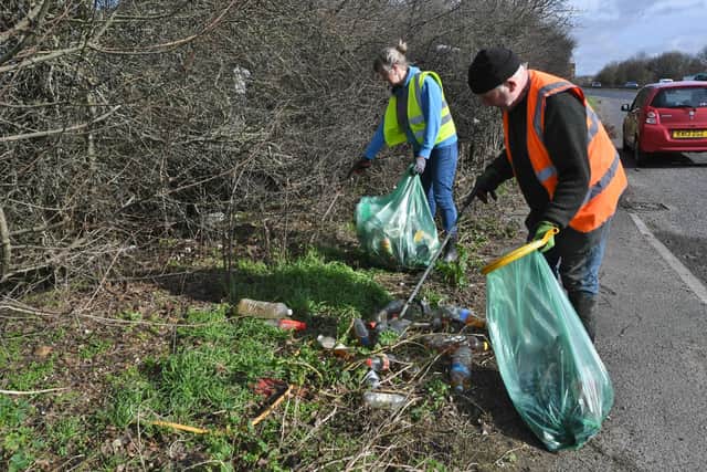 Jenny Wright and Mark Fishpool cleaning up layby on the Castor bypass