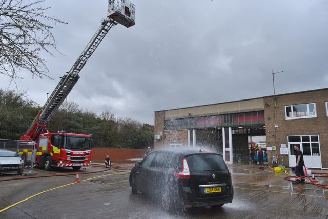 Stanground Fire Station green watch fire fighters at their annual Fire Fighters Charity car wash