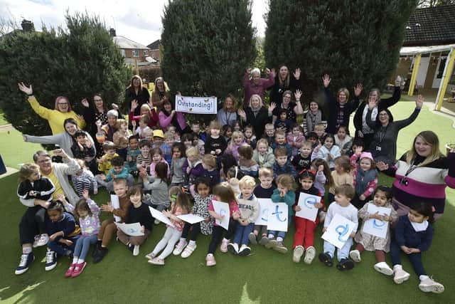 Staff and children at Caverstede Nursery School in Walton.