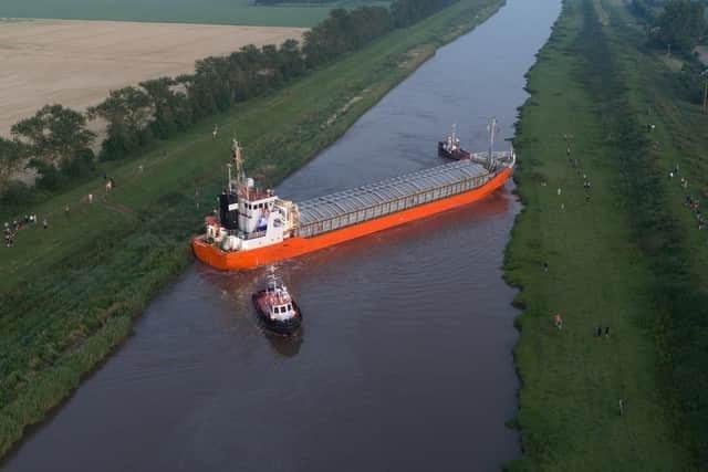 The 80m-long cargo ship Baltic Arrow ran aground and became stuck in the Nene on June 26 (image: Toby Elliott)