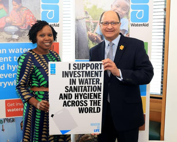 North West Cambridgeshire MP Shailesh Vara with a representative of WaterAid at the House of Commons