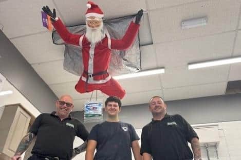 Three of the team set to take part in EACH's first Santa Skydive.