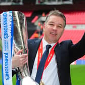 Posh manager Darren Ferguson with the Johnstone's Paint Trophy at Wembley in 2014. Photo Alan Storer.