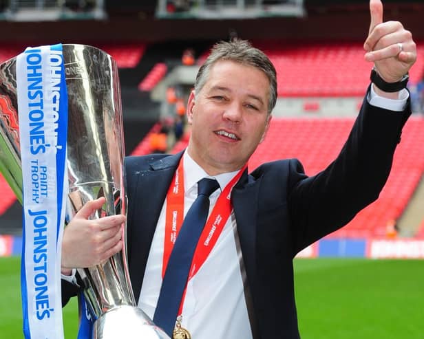 Posh manager Darren Ferguson with the Johnstone's Paint Trophy at Wembley in 2014. Photo Alan Storer.