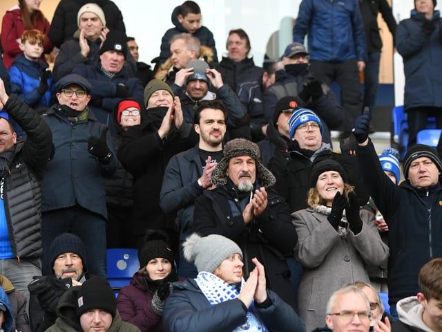 Peterborough United fans take in the win over Shrewsbury Town.