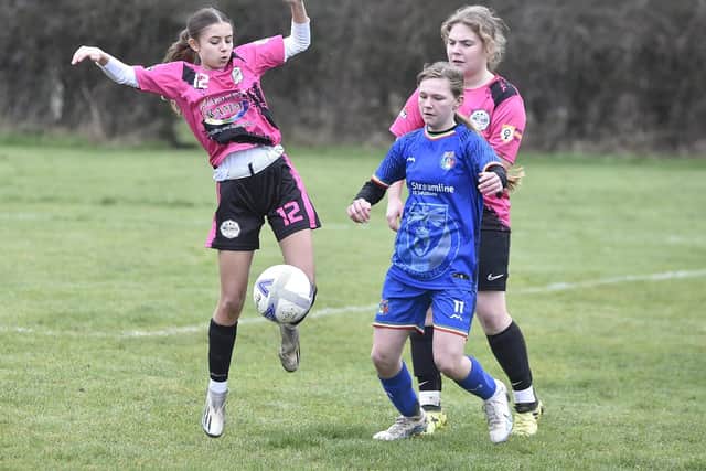 Action from ICA Sports (blue) v Girls United in the Cambs Giirls Under 18 League. Photo David Lowndes.