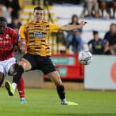Tyreece Simpson (left) in action for Swindon last season. (Photo by Pete Norton/Getty Images).