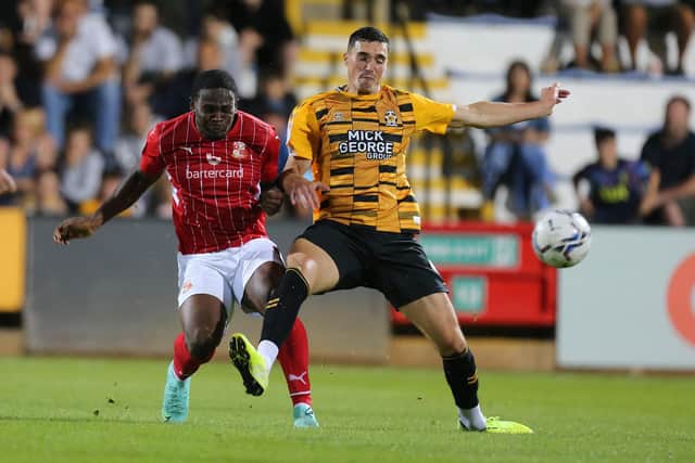 Tyreece Simpson (left) in action for Swindon last season. (Photo by Pete Norton/Getty Images).