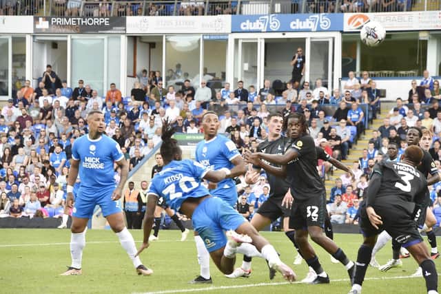 Peter Kioso of Posh heads towards the Charlton Athletic goal. Photo: David Lowndes.