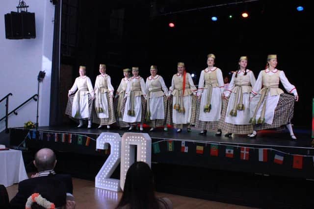 Lithuanian dancers in traditional costume help PARCA mark its landmark 20th anniversary at Peterborough College.