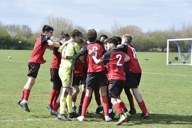 Netherton United celebrate their Under 14 Cup Final success. Photo: David Lowndes,