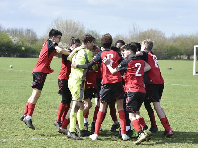 Netherton United celebrate their Under 14 Cup Final success. Photo: David Lowndes,