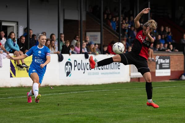 Keir Perkins (left) in action for Posh Women against Sheffield. Photo: Ruby Red Photography