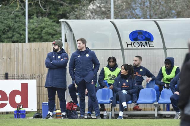 Interim Peterborough Sports manager Michael Gash (second left) and his assistant Dan Ruscillo during the game against Kidderminster Harriers at the Bee Arena. Photo: David Lowndes.