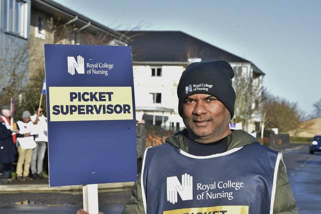 Kailash Ludhor, who is a mental health nurse at Cambridgeshire and Peterborough NHS Foundation Trust, on strike at the Doddington Hospital picket line on Tuesday (December 20).