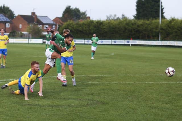 Action from an FC Peterborough (green) match.