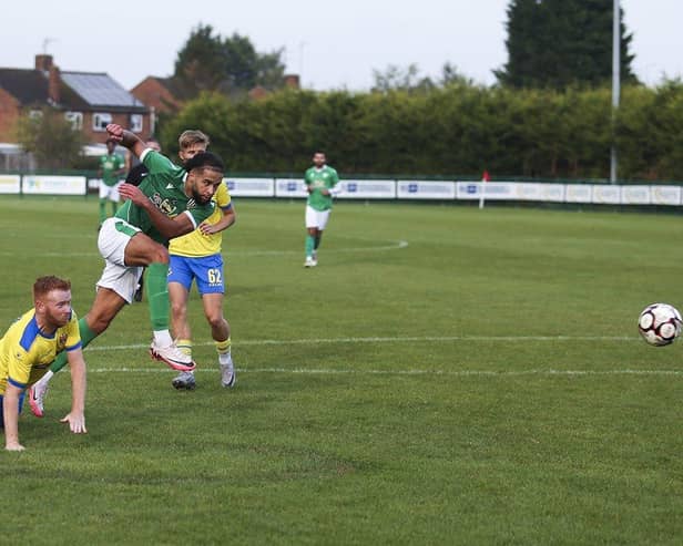 Action from an FC Peterborough (green) match.