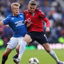 Ronan Hale (red) playing for Ross County against Rangers last season. (Photo by Ian MacNicol/Getty Images)