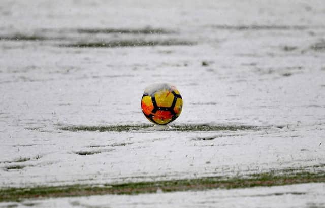 Snow could play havoc with local football fixtures. Photo: Getty Images.