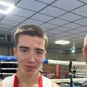 Dylan Watt with boxing coach Sam Needham.