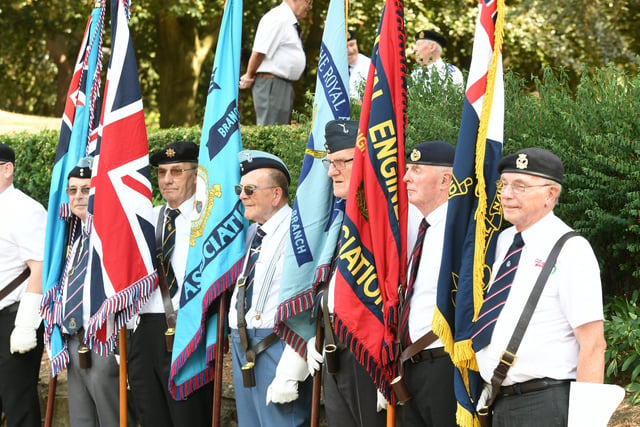 VJ Day memorial service at Central Park with Royal British Legion standard bearers on duty.