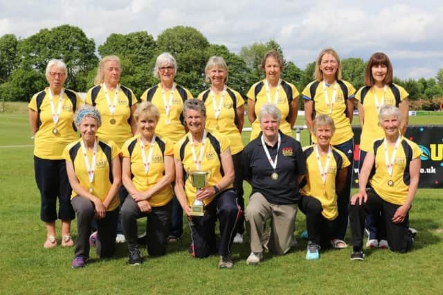 The winning East Over 65s hockey team. Ruth Swann is front row, second left, while Liz Dakin is back row, second left.