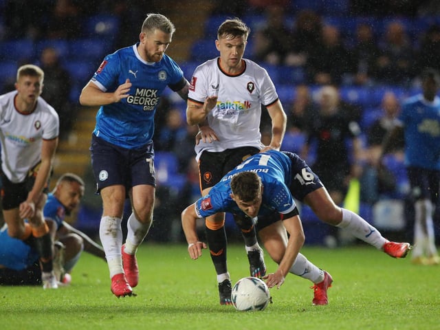 Did you see the FA Cup tie against Salford at London Road? A quite dreadful spectacle which finished 0-0. Harrison Burrows is pictured taking a tumble during the game.