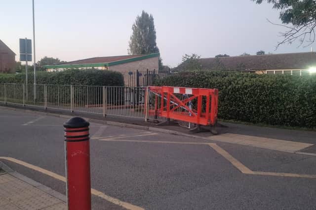 The damaged barrier outside of Eye Primary School.