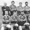 Mick Daykin (third left, bottom row) before a rugby union match at Fengate in 1983.