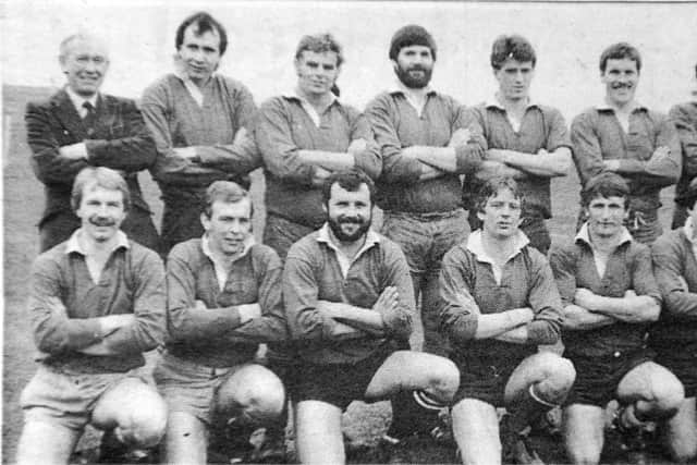 Mick Daykin (third left, bottom row) before a rugby union match at Fengate in 1983.