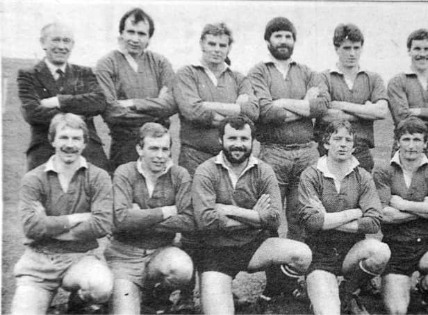 Mick Daykin (third left, bottom row) before a rugby union match at Fengate in 1983.