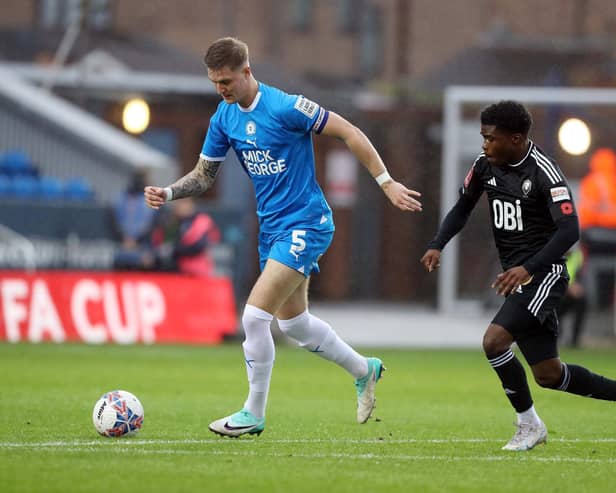 Josh Knight of Peterborough United in action against Salford City. Photo: Joe Dent.