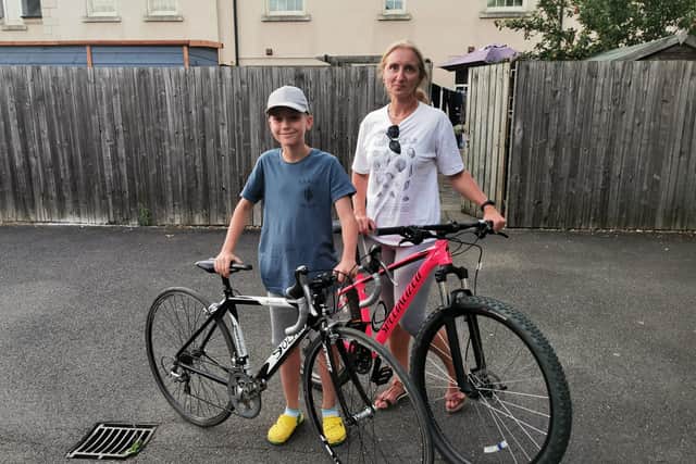 Oksana and Illia with their bikes