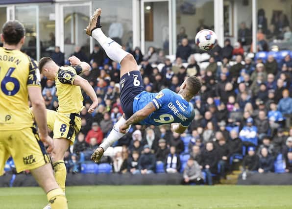 Posh skipper Jonson Clarke-Harris tries an overhead kick against Oxford. Photo: David Lowndes.