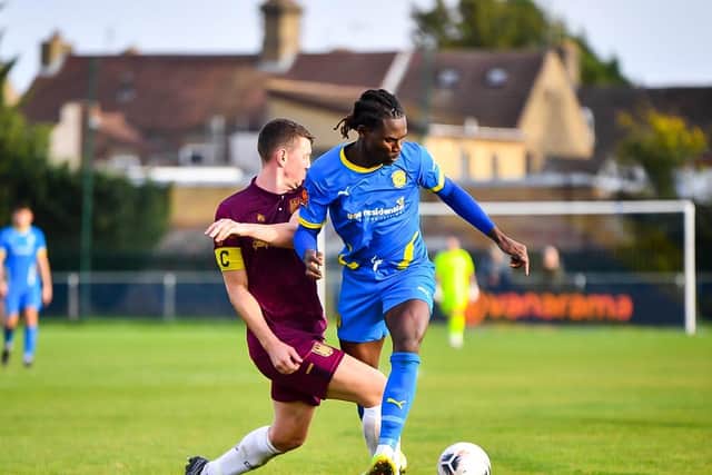 Maniche Sanie (blue) in action for Peterborough Sports against Chorley. Photo: James Richardson