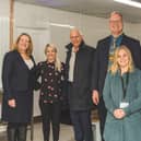 Allison Homes and its partners receive a tour of the newly refurbished community kitchen at the Ferry Project in Wisbech.
