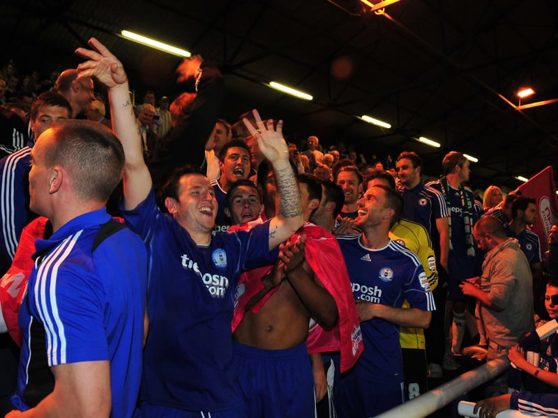 A second leg play off match in 2011 which delivered the best atmosphere many have ever experienced at London Road. Posh had lost the first leg 3-2, but goals from Grant McCann and Craig Mackail-Smith sent Posh to an Old Trafford Final against Huddersfield which they won 3-0. Lee Tomlin is pictured leading the post-match celebrations after the MK win.