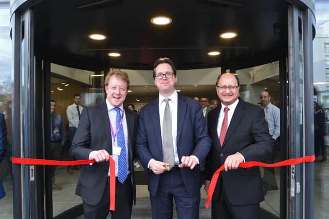 Cabinet Office minister Alex Burghart, centre, opens the Government Hub at Fletton Quays  with Shailesh Vara MP and Paul Bristow MP
