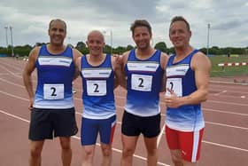The winning relay team of Paul Long, Dave Brown, Russell Dowers and Sean Reidy.